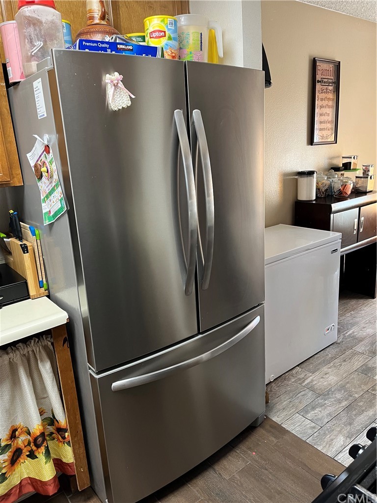 371 Redbud Place Perris, CA 92570 - Photo 12 of 27 a close view of stove and refrigerator