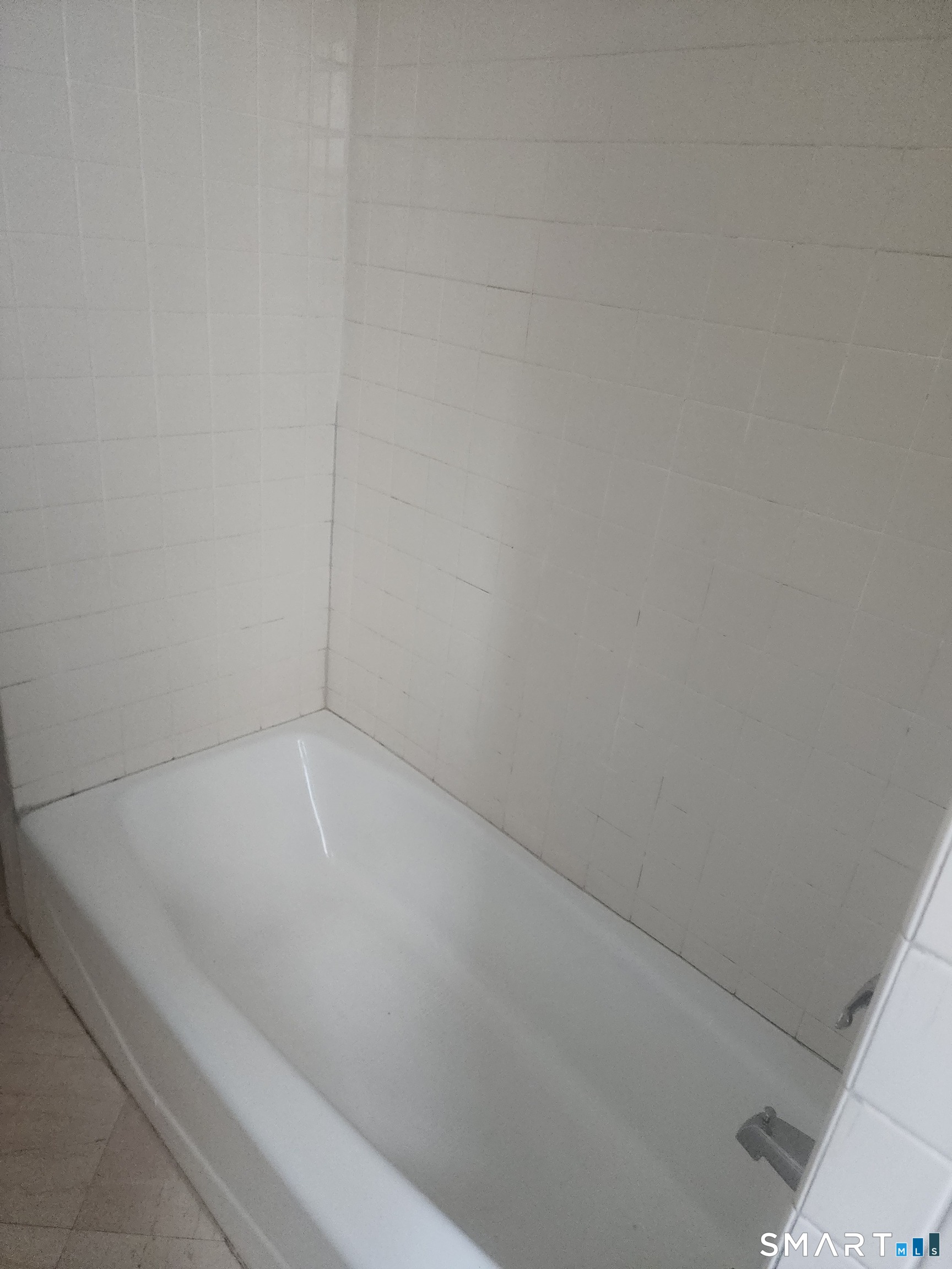 2744 Main Street Bridgeport, CT 06606 - Photo 6 of 12 a close up of a bathtub