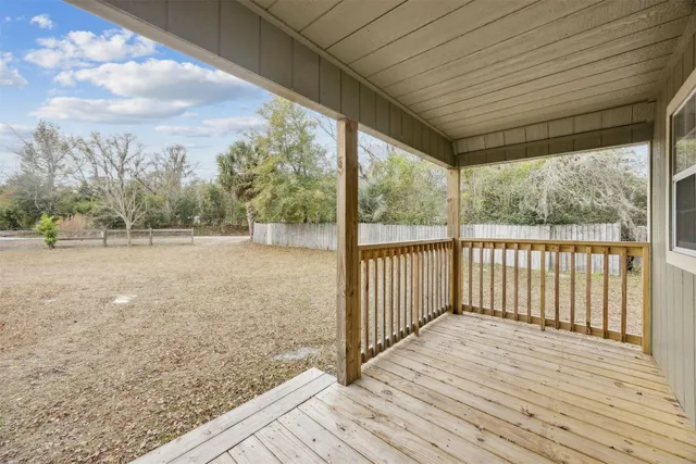 a view of backyard with green space