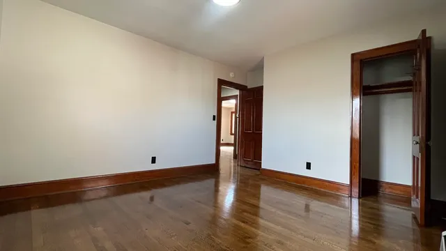 a kitchen with cabinets appliances a sink and a window