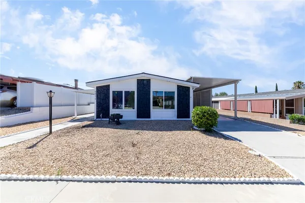 a view of a house with a patio