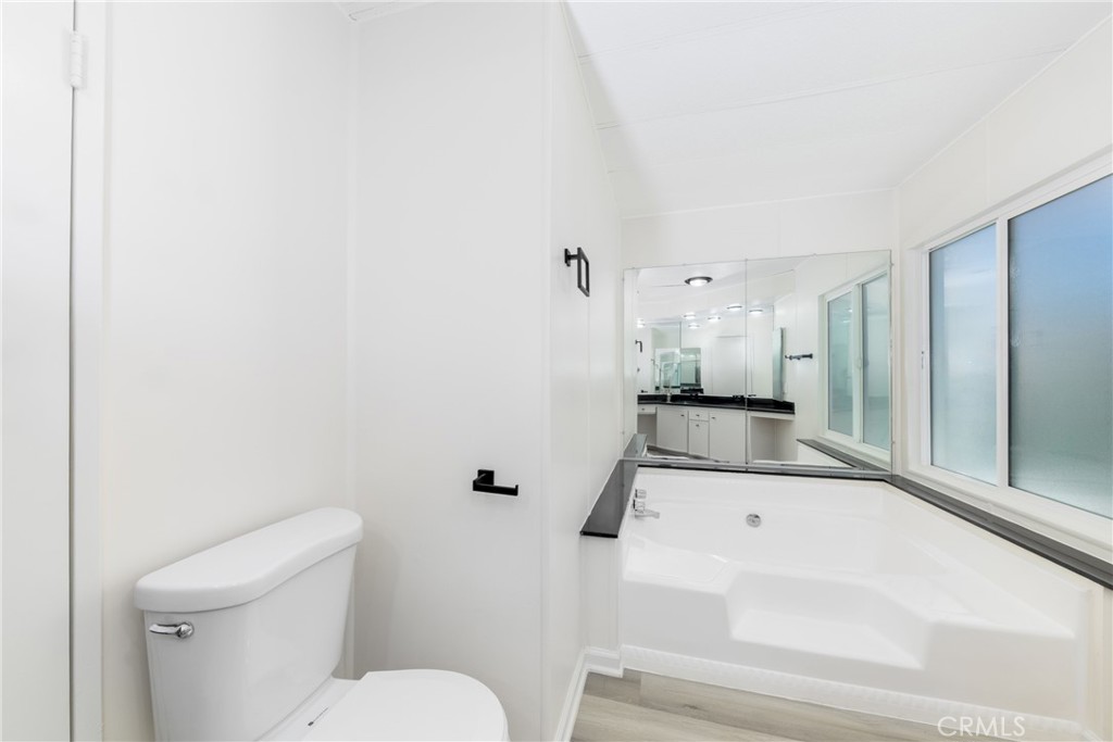 40975 Laredo Trail Cherry Valley, CA 92223 - Photo 16 of 34 a bathroom with a sink a toilet and shower