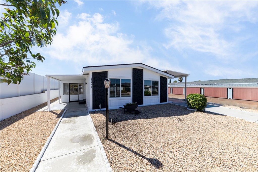 40975 Laredo Trail Cherry Valley, CA 92223 - Photo 2 of 34 front view of a house with a yard