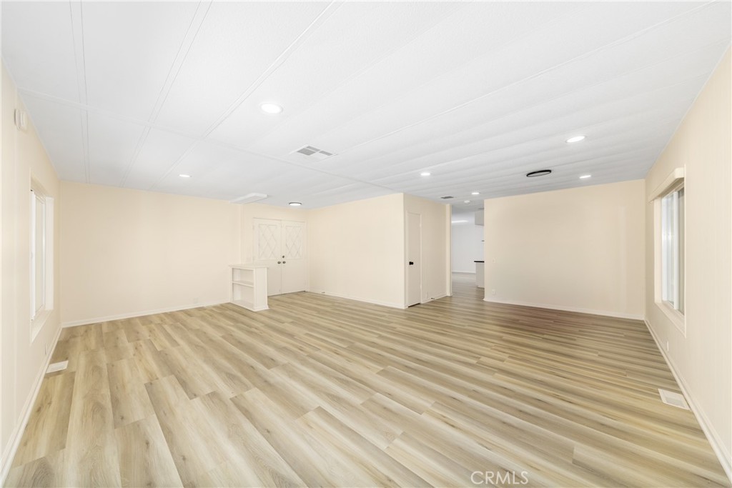 40975 Laredo Trail Cherry Valley, CA 92223 - Photo 4 of 34 a view of empty room with wooden floor