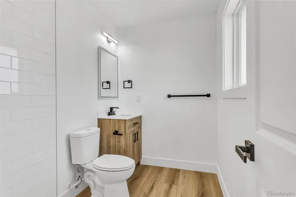 a bathroom with a toilet and a sink