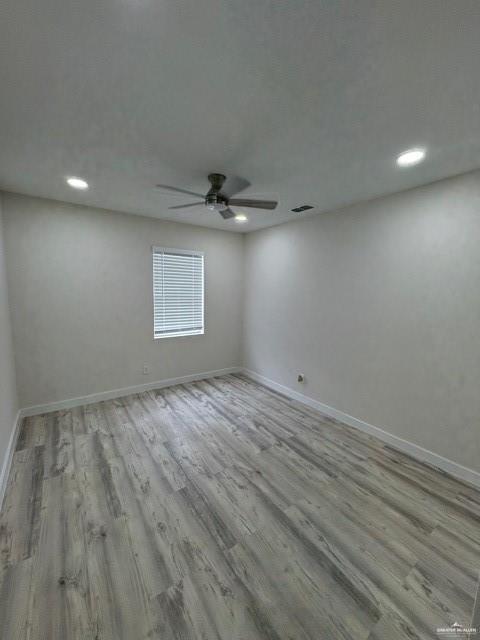 2617 Daytona Avenue McAllen, TX 78503 - Photo 4 of 17 an empty room with a empty space and windows