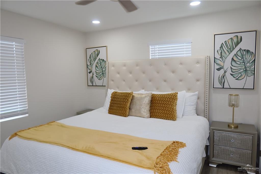 2617 Daytona Avenue McAllen, TX 78503 - Photo 8 of 17 a bedroom with a bed and painting on the wall