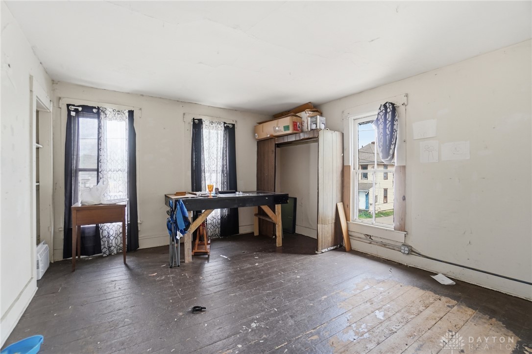 517 Broadway Street, Unit 515 Springfield, OH 45504 - Photo 24 of 29 This versatile room features expansive windows and durable wood flooring.