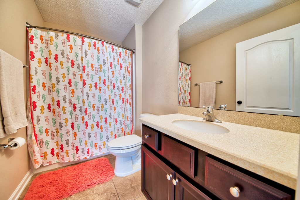 95199 Windflower Trail Fernandina Beach, FL 32034 - Photo 20 of 29 a bathroom with a sink toilet and shower