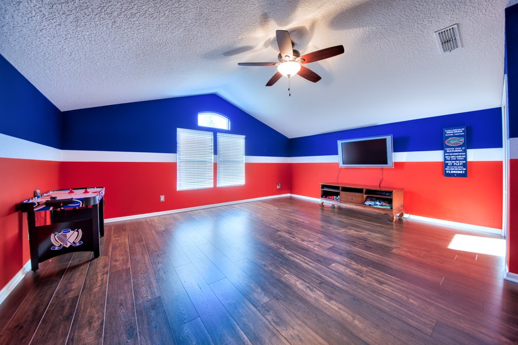 95199 Windflower Trail Fernandina Beach, FL 32034 - Photo 22 of 29 a living room with furniture and wooden floor