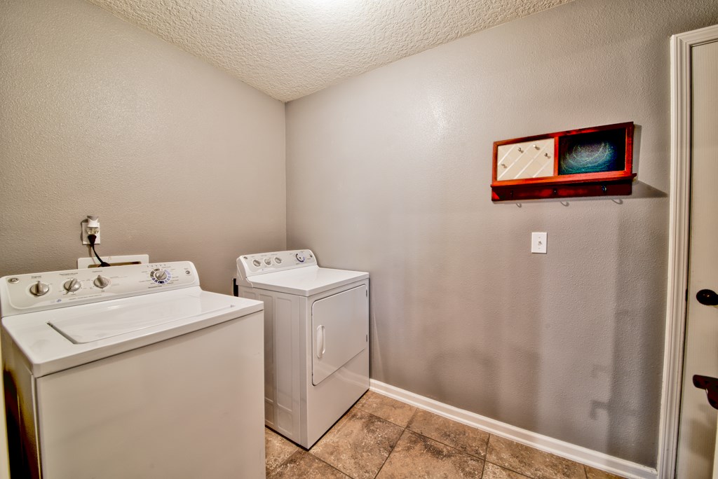 95199 Windflower Trail Fernandina Beach, FL 32034 - Photo 24 of 29 a utility room with dryer and washer