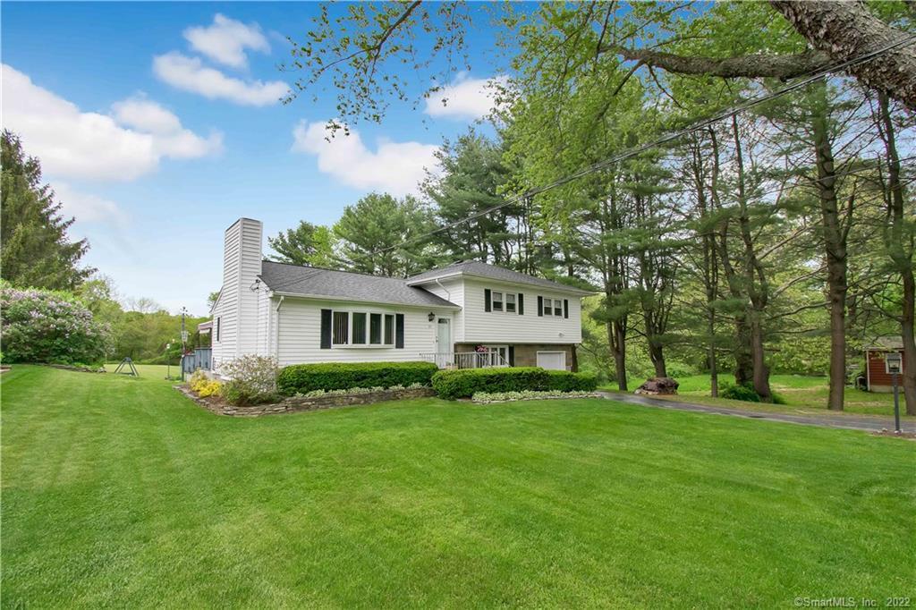 a house view with a garden space