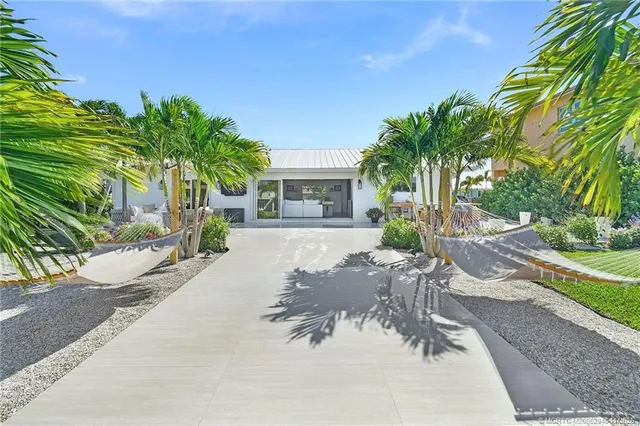 a view of a backyard with a patio