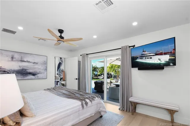 a bathroom with a sink a mirror and a shower