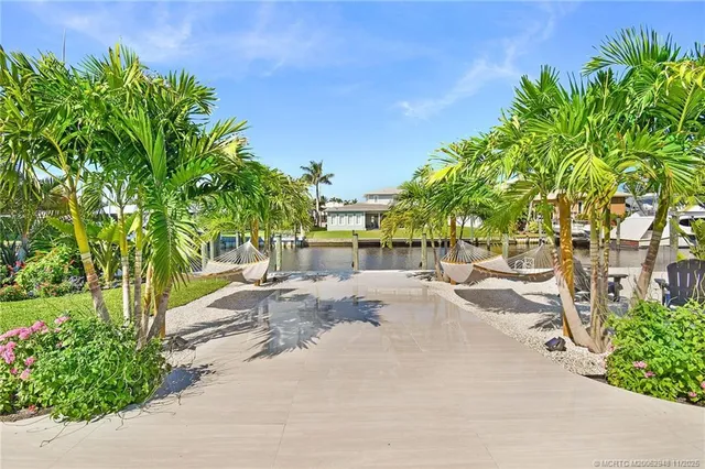 a view of a street with a building in the background