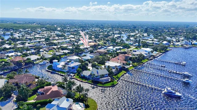 a view of a swimming pool and lounge chair