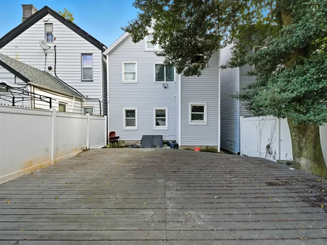 a view of a backyard of the house