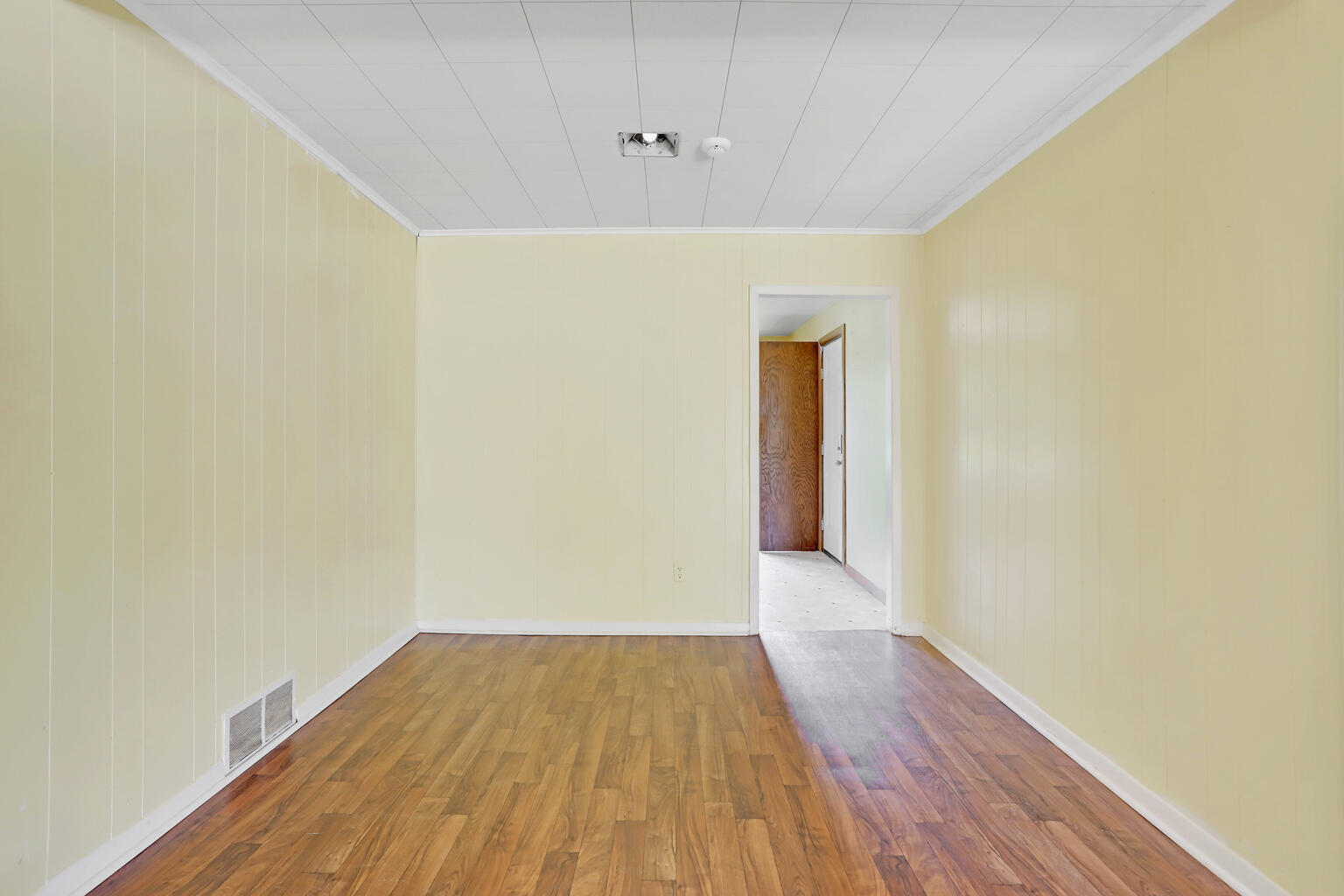 1220 West Semor Drive Decatur, IL 62521 - Photo 15 of 27 a view of a hallway with wooden floor