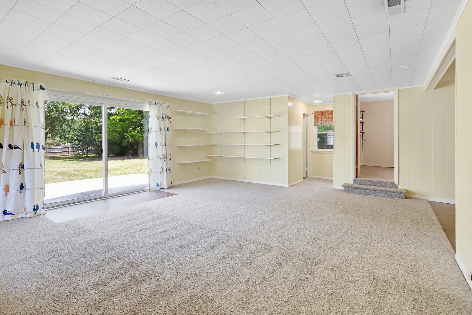 1220 West Semor Drive Decatur, IL 62521 - Photo 18 of 27 a view of an empty room with a window