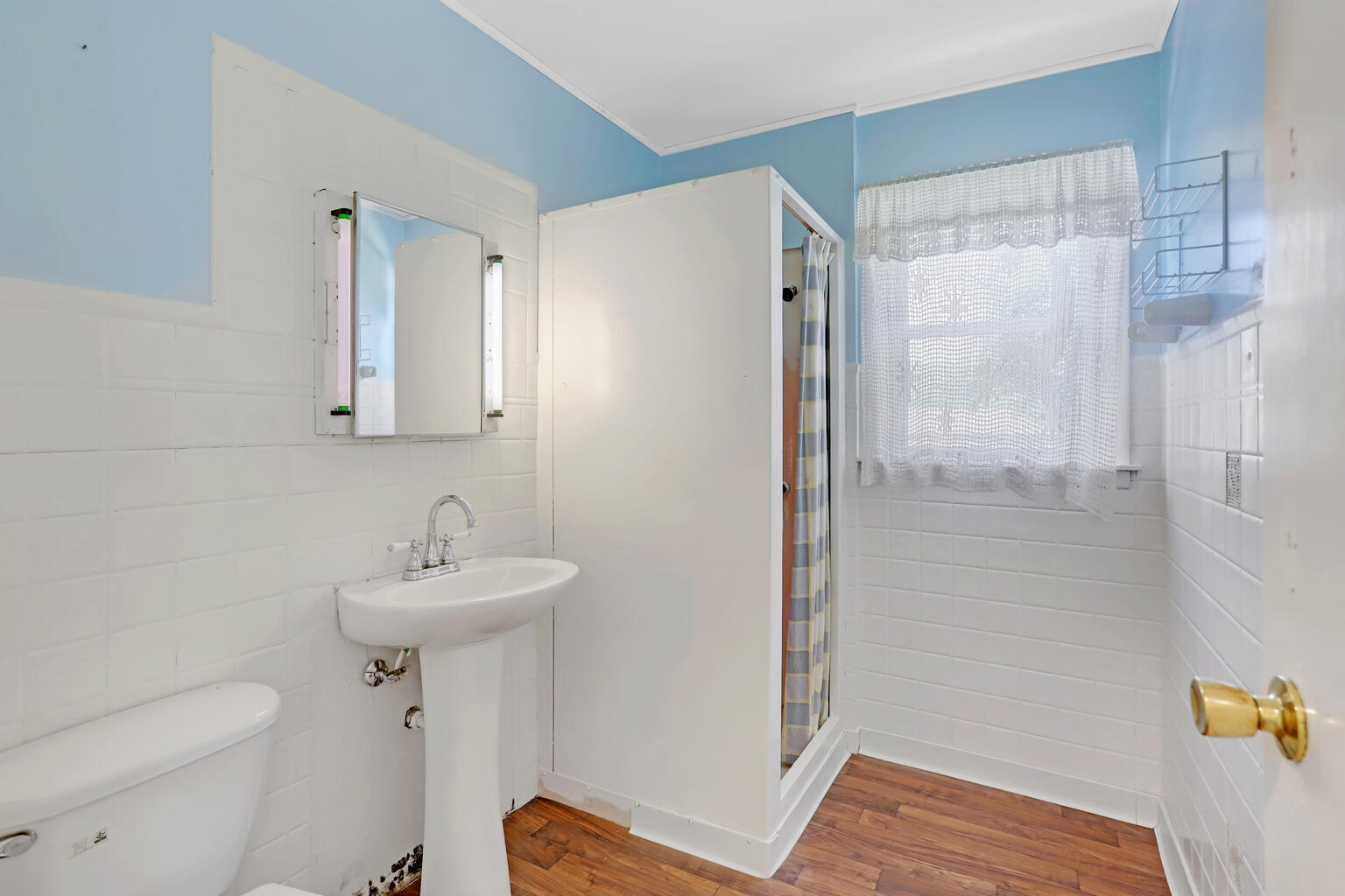 1220 West Semor Drive Decatur, IL 62521 - Photo 19 of 27 a bathroom with a sink toilet and shower