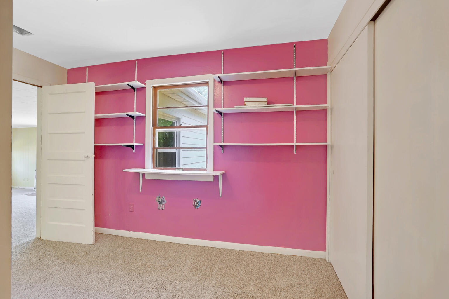 1220 West Semor Drive Decatur, IL 62521 - Photo 21 of 27 a pink room with pink walls