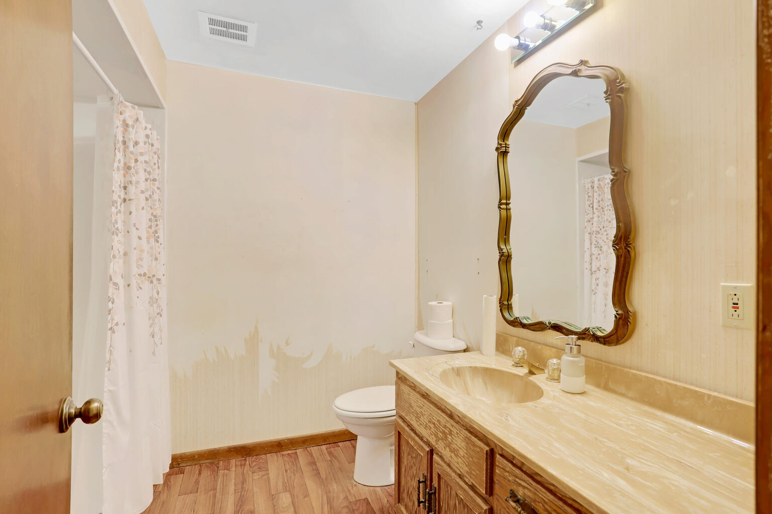 1220 West Semor Drive Decatur, IL 62521 - Photo 22 of 27 a bathroom with a granite countertop sink toilet and shower