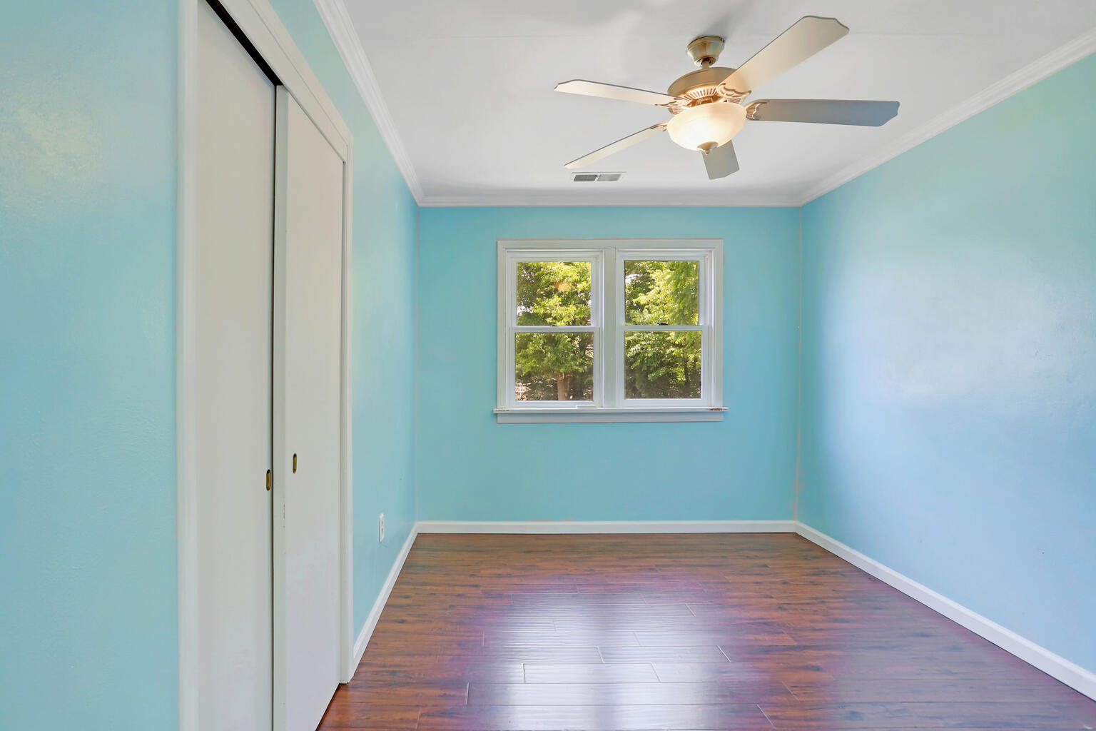 1220 West Semor Drive Decatur, IL 62521 - Photo 23 of 27 wooden floor in an empty room with a window