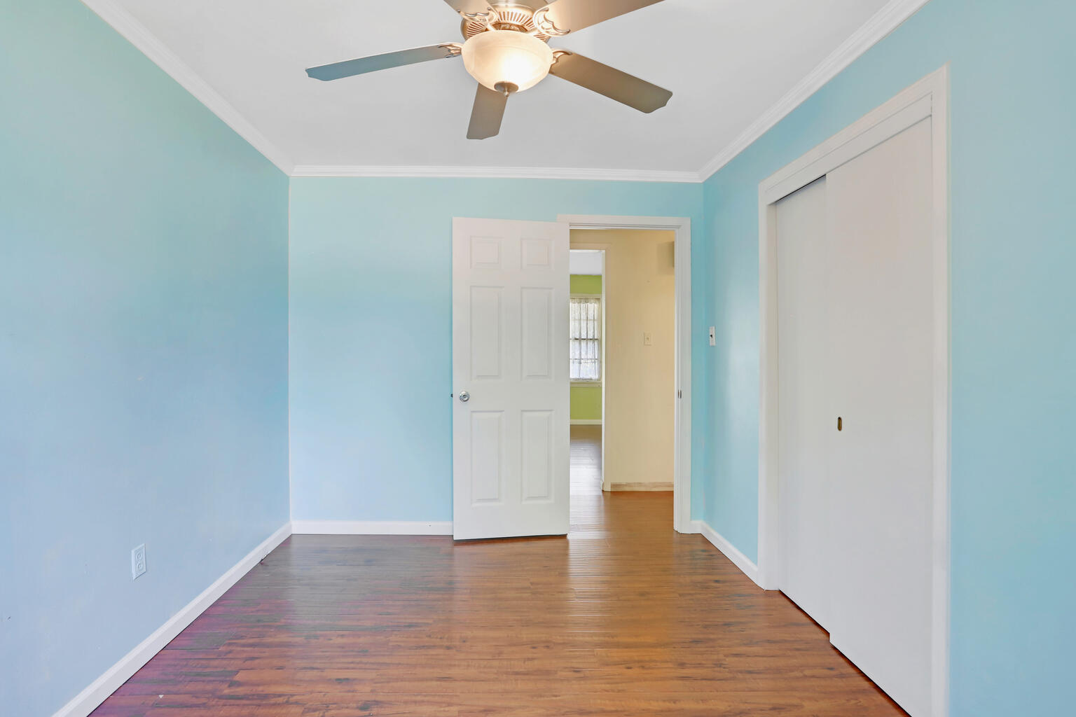1220 West Semor Drive Decatur, IL 62521 - Photo 24 of 27 a view of an empty room with wooden floor