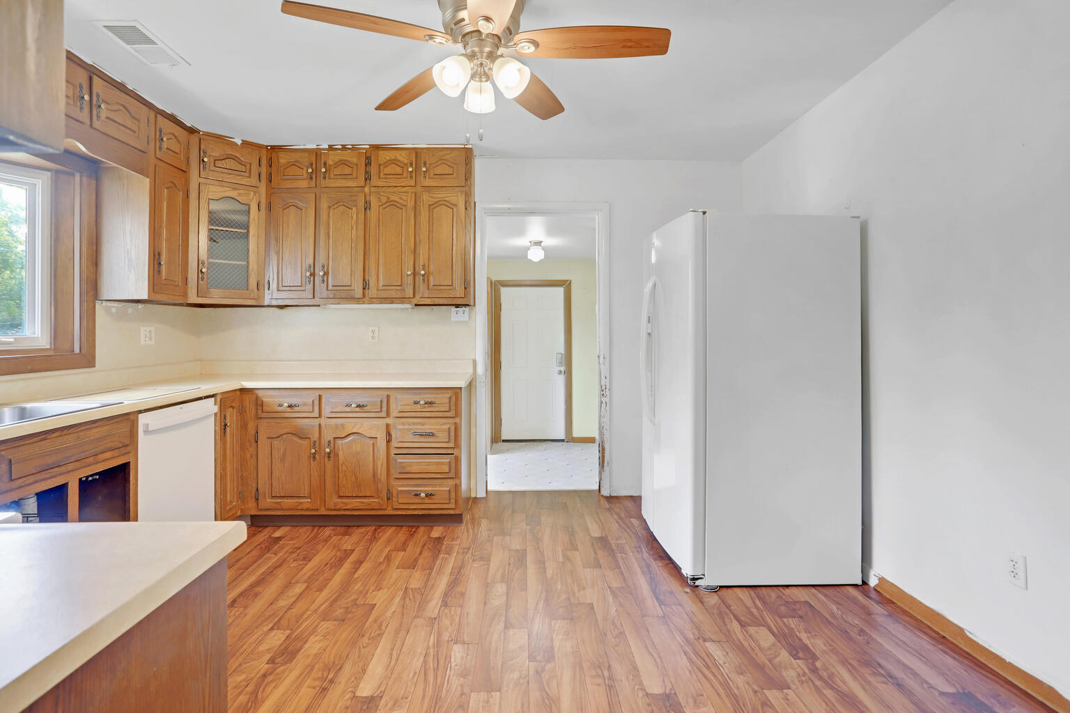 1220 West Semor Drive Decatur, IL 62521 - Photo 10 of 27 a view of a kitchen cabinets a sink and dishwasher