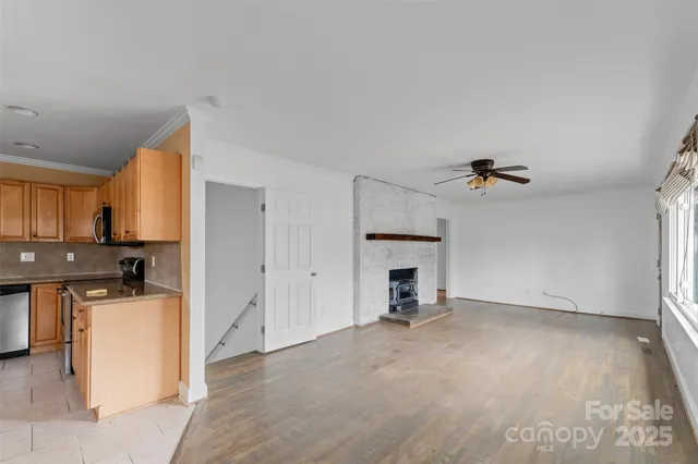 a view of a kitchen with a sink cabinets and window