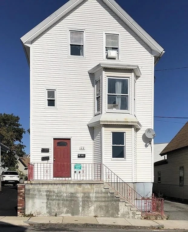 32 Wamesit Street, Unit 2 Lowell, MA 01852 - Photo 2 of 9 a front view of a house