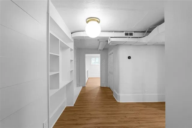 a bathroom with a sink a mirror and a toilet
