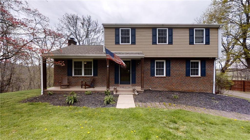 FRONT PORCH: 23 X 4: Newly Refinished Granite-Grip on Concrete Pad, New Aluminum Cladding on Ceiling, New Light Fixtures, New Shutters, New Vinyl Siding, New Wood Wrapped Posts, New Windows Throughout, Brick Facade