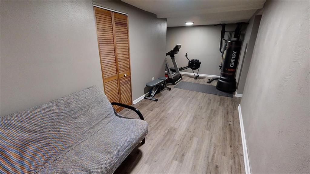 111 Valley View Road Eighty Four, PA 15330 - Photo 20 of 25 GAME ROOM: 232 X 137: New Wood-Look Vinyl Plank Flooring, New LED Lighting, Fresh Neutral Paint