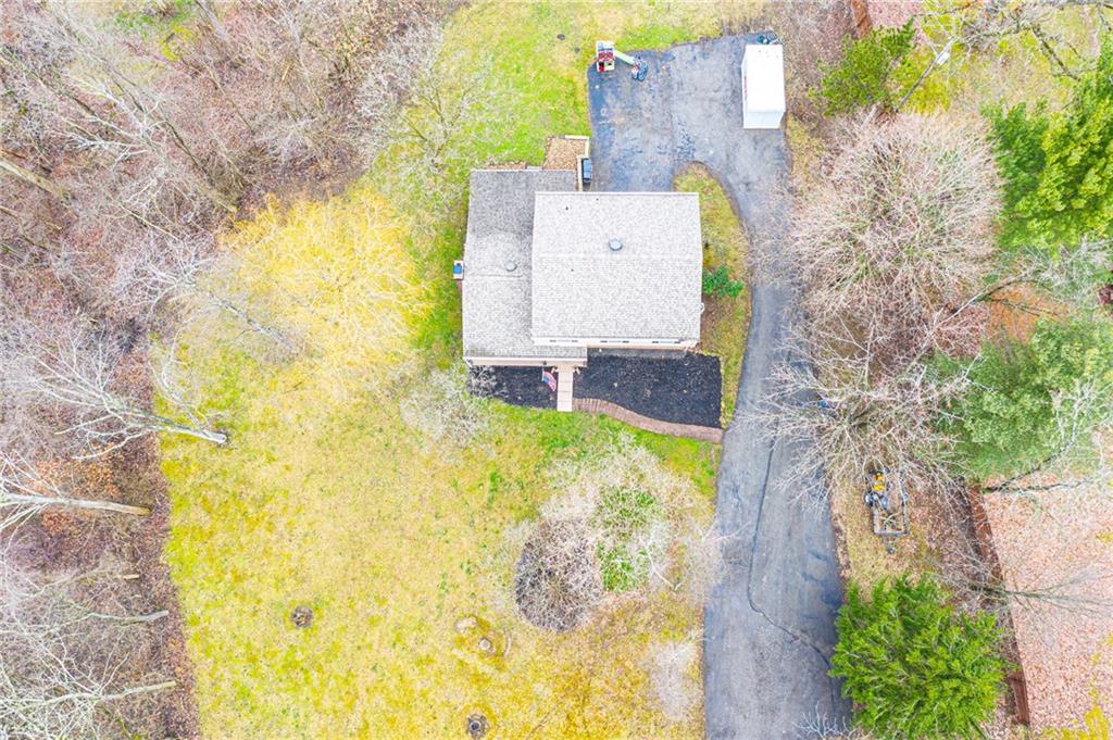 111 Valley View Road Eighty Four, PA 15330 - Photo 25 of 25 EXTERIOR: 3.5 Acres: New Vinyl Siding, Brick Faade, New Shutter, New Double-Pane New , Construction, Anderson Windows with Built-in Muttons, New Roof, New Gutters and Downspouts, New Soffit and Fascia, Two Freshly Painted Sheds, Newly refinished Privacy Fence, 15-20 Car Driveway, 2500 Gallon Cistern, Optional 200-foot Well, Septic System (Maintained by Hapchuk)