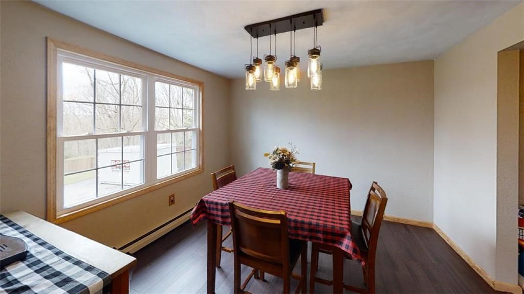 DINING ROOM: 1011 X 1010: New Bamboo Hardwood Flooring, New Oil Rubbed Bronze Lighting, New Solid Wood Trim, Fresh Neutral Paint