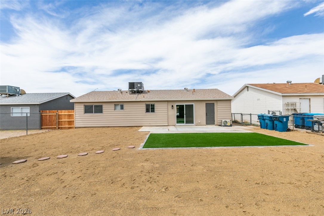 4036 Maple Hill Road Las Vegas, NV 89115 - Photo 41 of 43 A private yard with a fresh patio awaits for outdoor living.