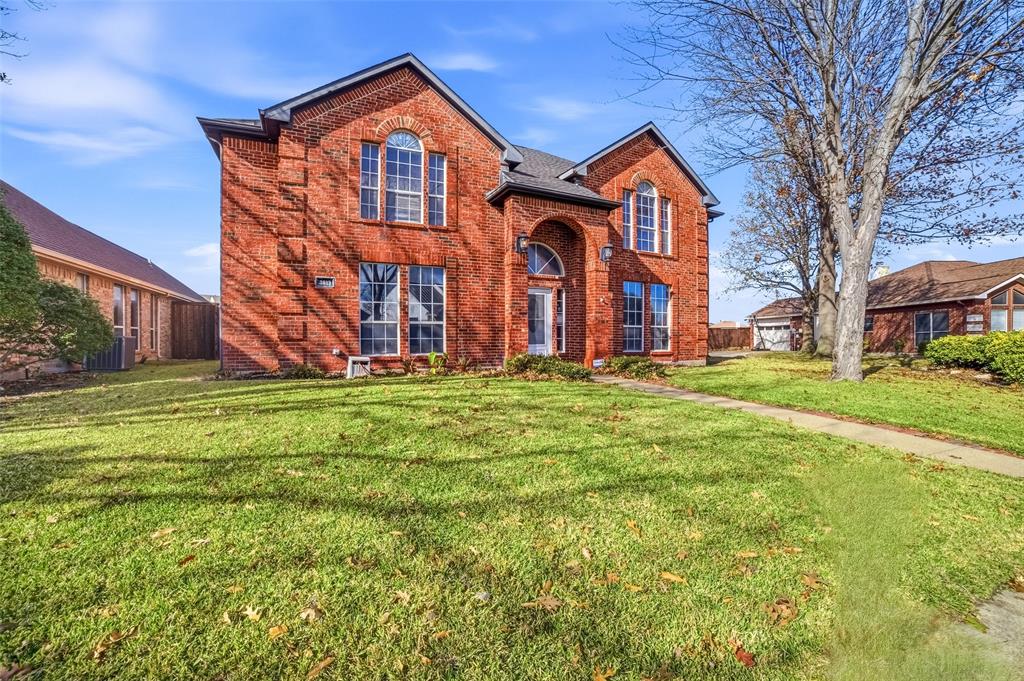 3613 Bermuda Drive Rowlett, TX 75088 - Photo 2 of 35 a front view of a house with a yard