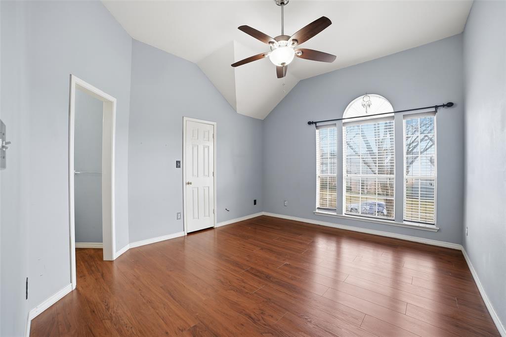 3613 Bermuda Drive Rowlett, TX 75088 - Photo 24 of 35 a view of an empty room with wooden floor and a window