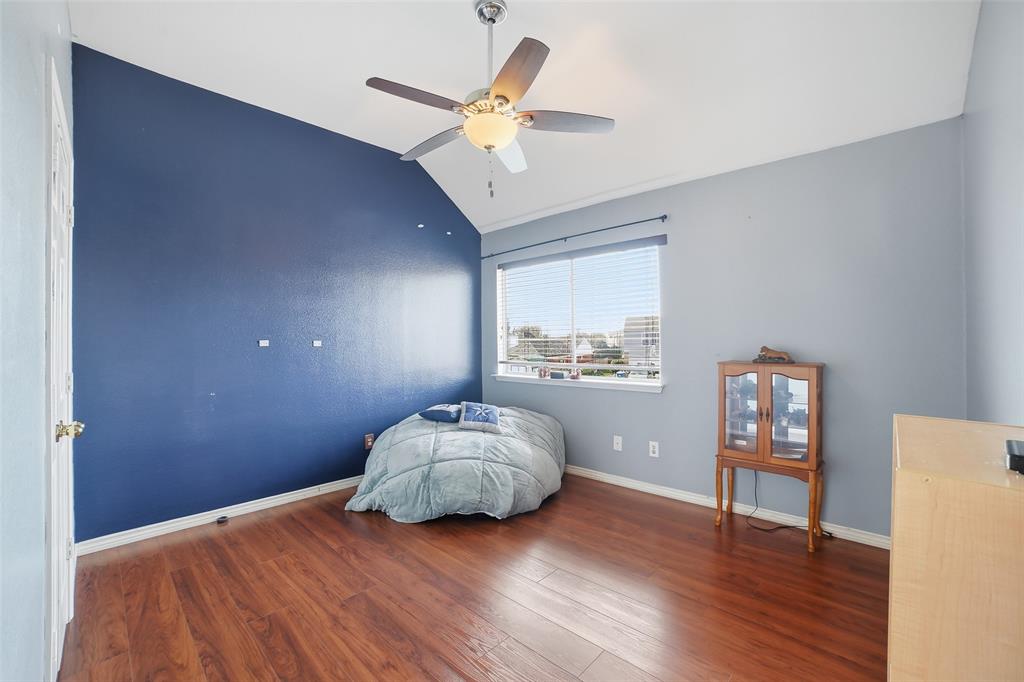 3613 Bermuda Drive Rowlett, TX 75088 - Photo 28 of 35 a living room with furniture and wooden floor