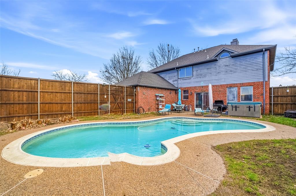 3613 Bermuda Drive Rowlett, TX 75088 - Photo 29 of 35 a view of a house with swimming pool and yard