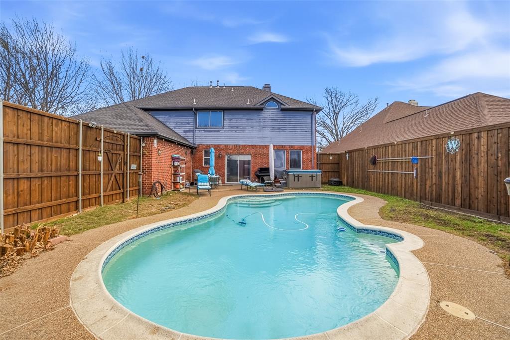 3613 Bermuda Drive Rowlett, TX 75088 - Photo 30 of 35 a view of a swimming pool with a patio