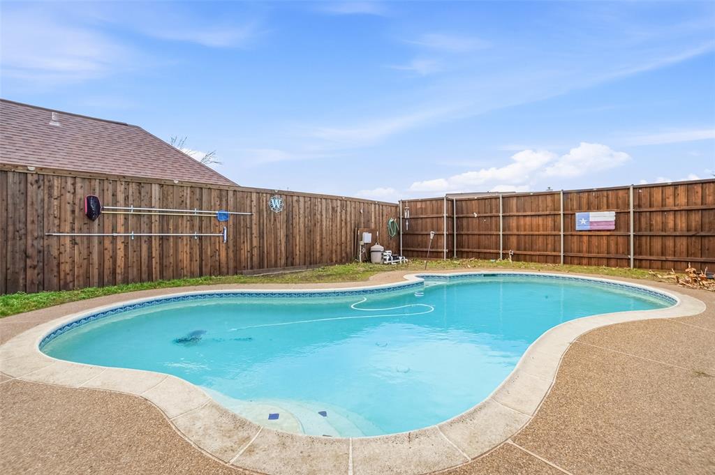 3613 Bermuda Drive Rowlett, TX 75088 - Photo 31 of 35 a view of a swimming pool with an outdoor space and seating area