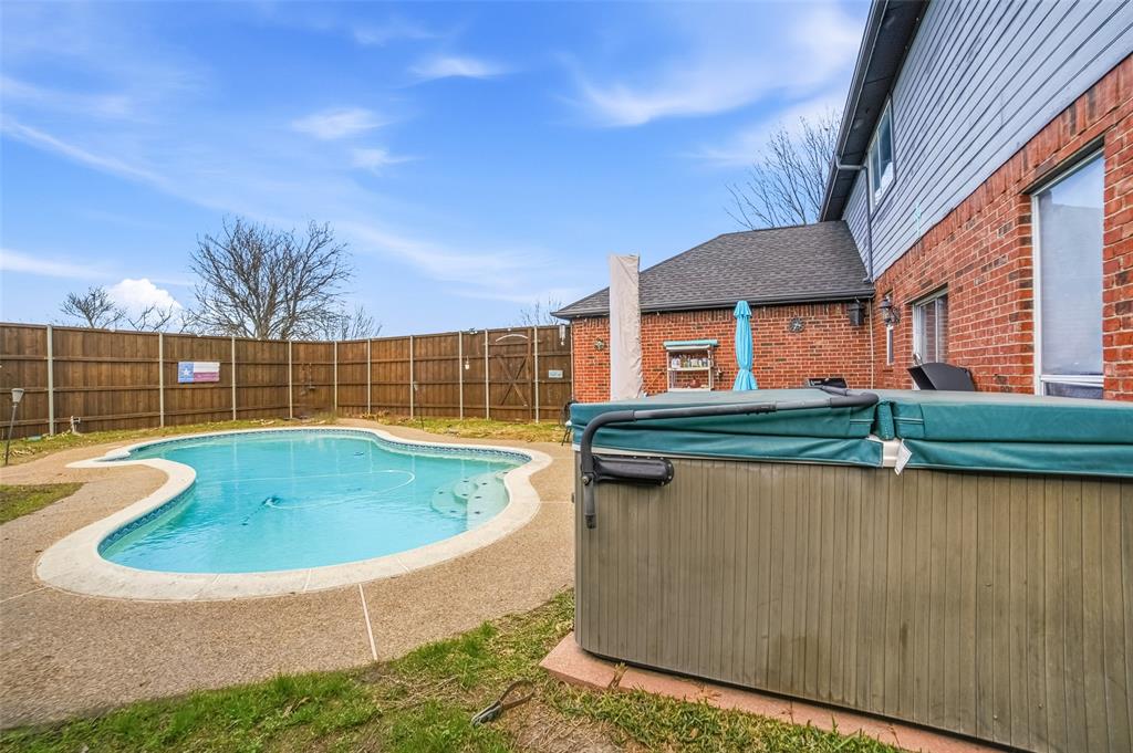 3613 Bermuda Drive Rowlett, TX 75088 - Photo 32 of 35 a view of swimming pool with a yard