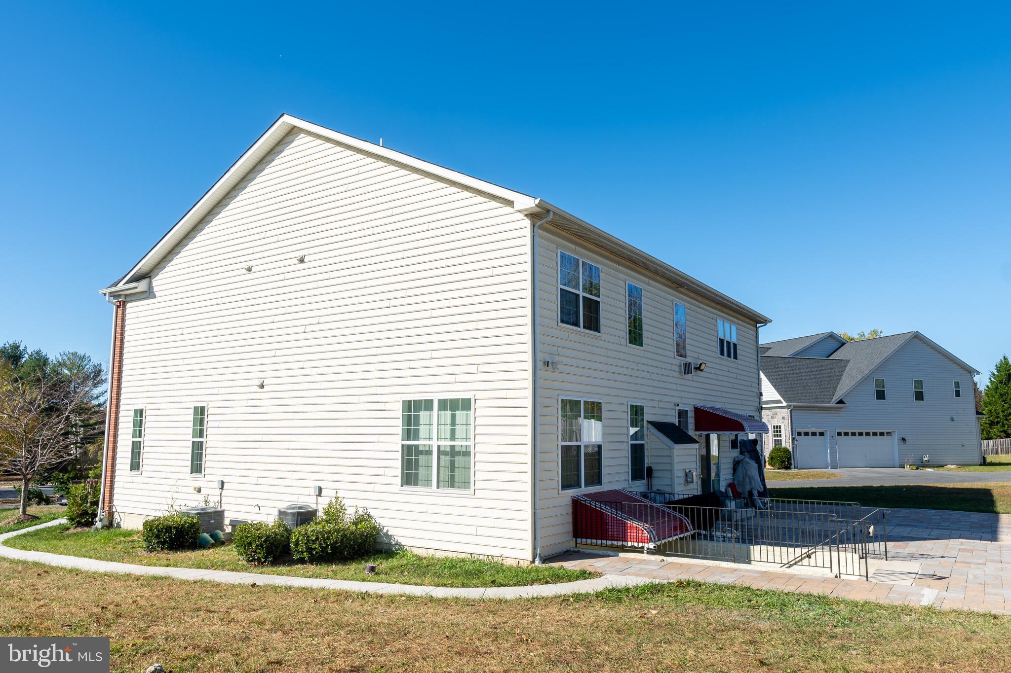 21 Old Bonifant Road, Unit BASEMENT APARTMENT Silver Spring, MD 20904 - Photo 3 of 12 Walkway to Basement Apartment