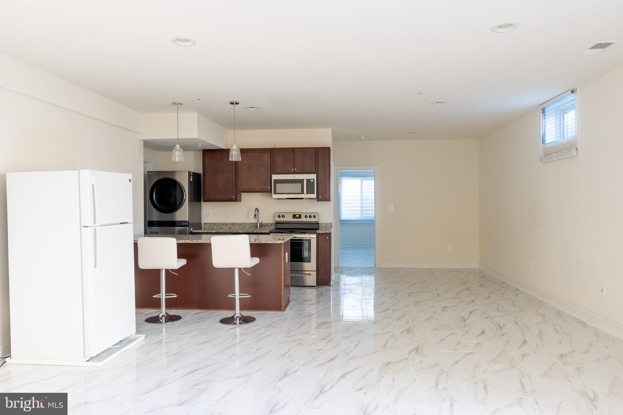 21 Old Bonifant Road, Unit BASEMENT APARTMENT Silver Spring, MD 20904 - Photo 5 of 12 Fully Equipped Kitchen