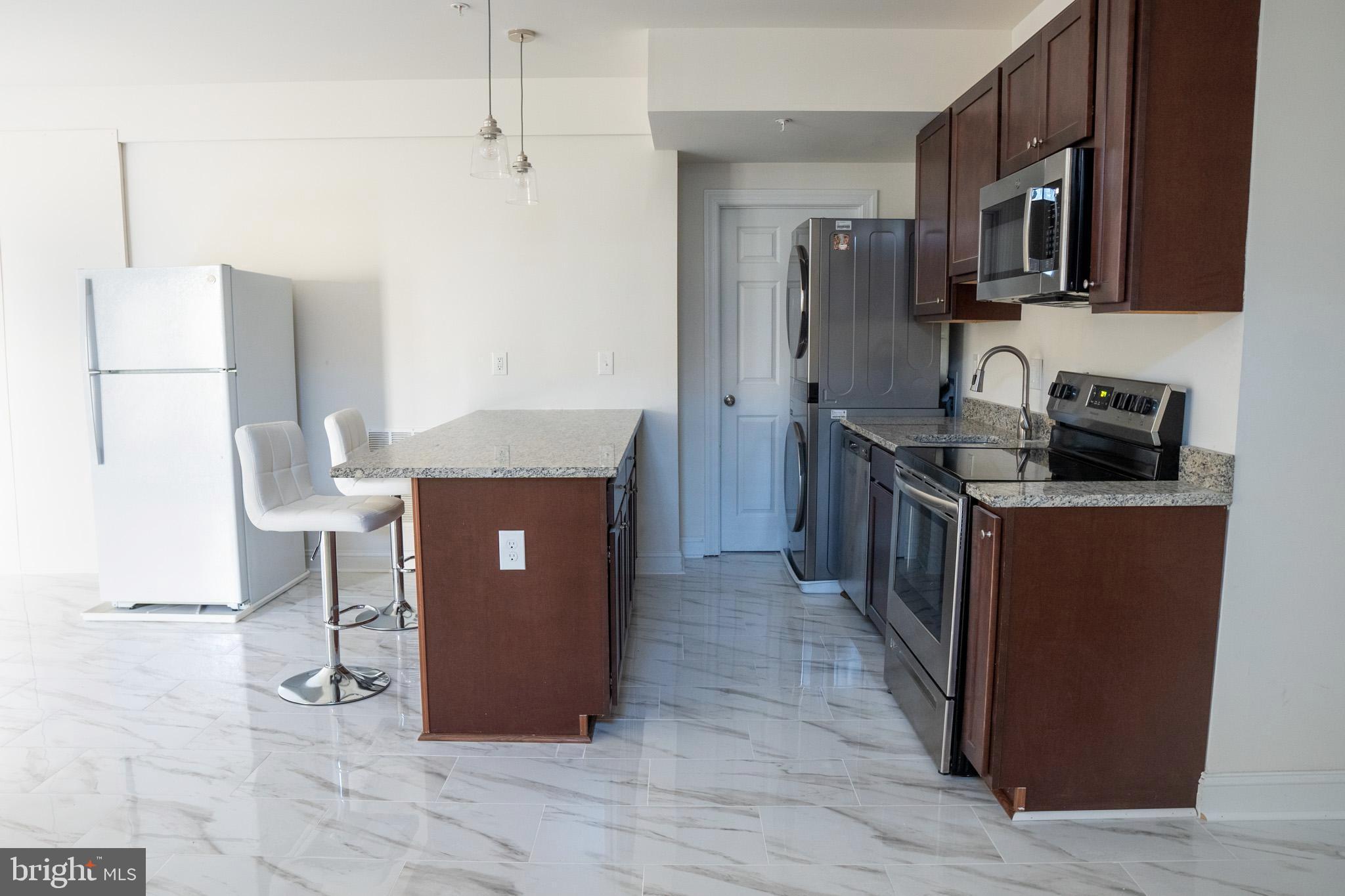 21 Old Bonifant Road, Unit BASEMENT APARTMENT Silver Spring, MD 20904 - Photo 6 of 12 Fully Equipped Kitchen