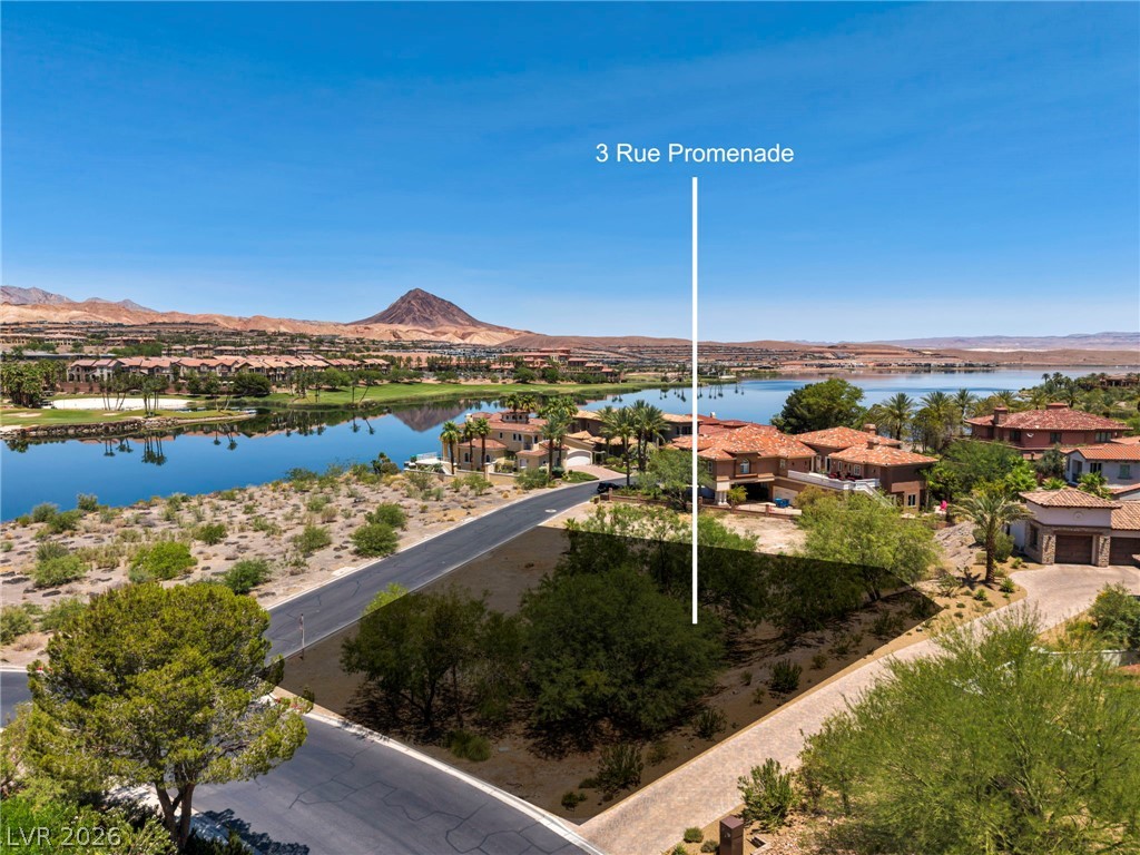 3 Rue Promenade Way Henderson, NV 89011 - Photo 3 of 26 Premium parcel in a lakefront community with mountain backdrops and a golf course.