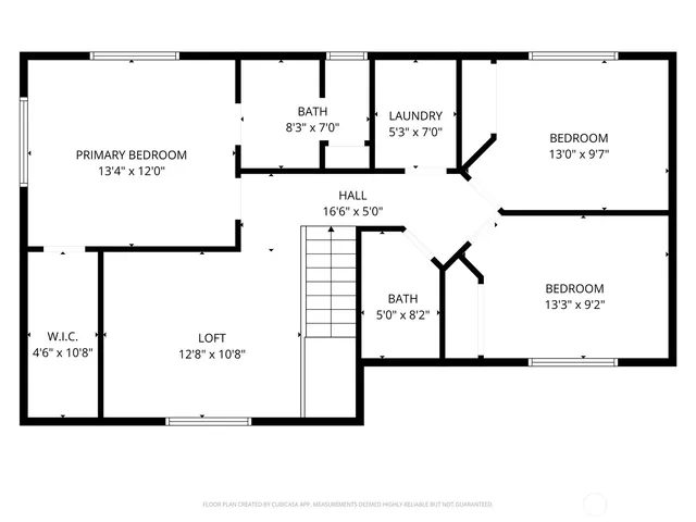 a view of backyard of house with wooden fence