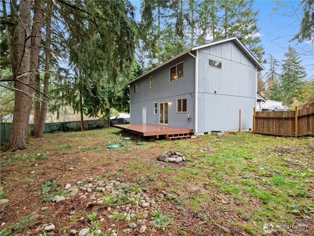 a view of a pool with a yard